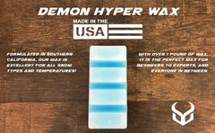 Demon Hyper wax being applied with an iron to a ski base for quick, uniform glide improvement