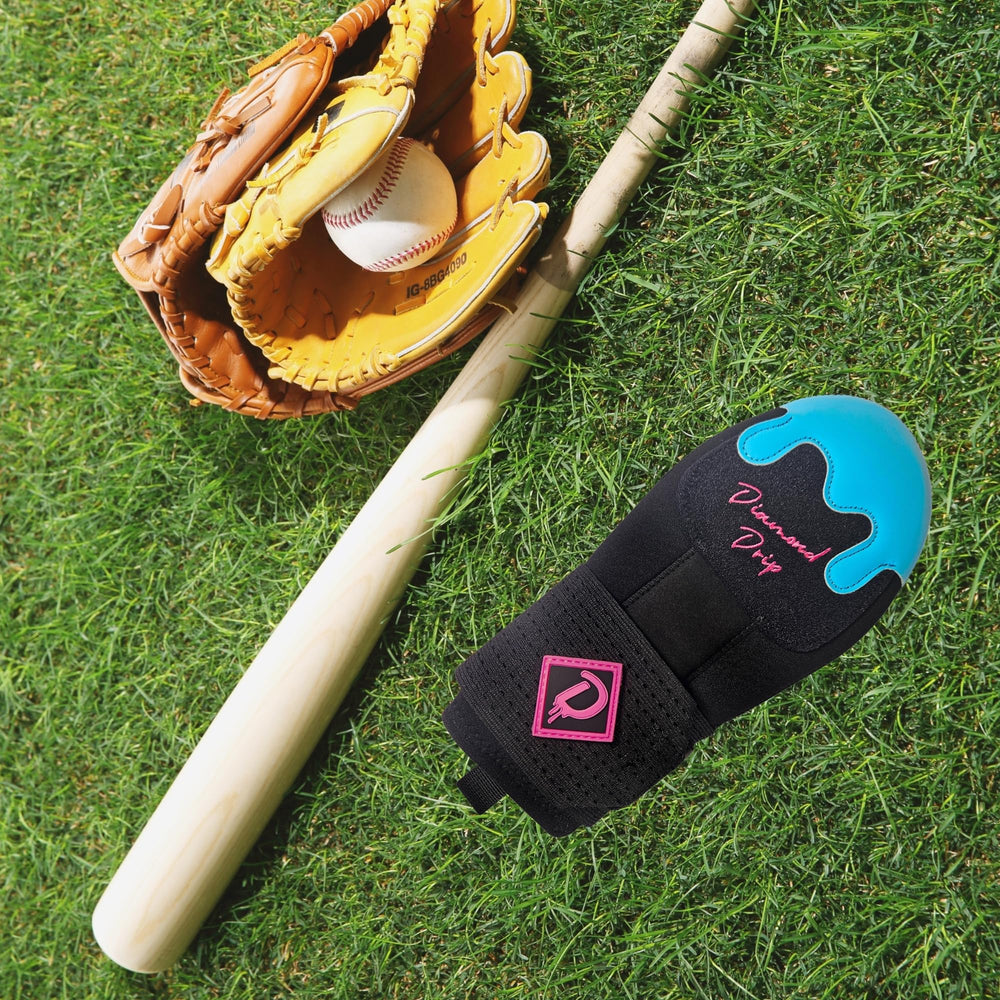 Diamond Drip mitt next to baseball showing compact size and easy storage