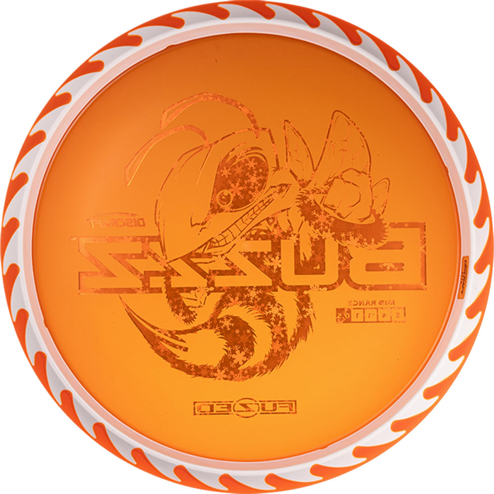 Discraft Fuzed Z Buzzz held in hand to show size and comfortable grip benefit