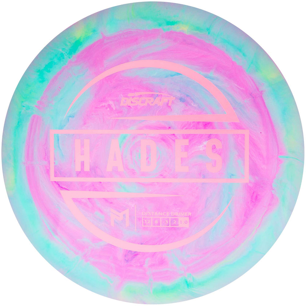 Discraft Hades in play mid-throw demonstrating distance potential and stable finish benefit