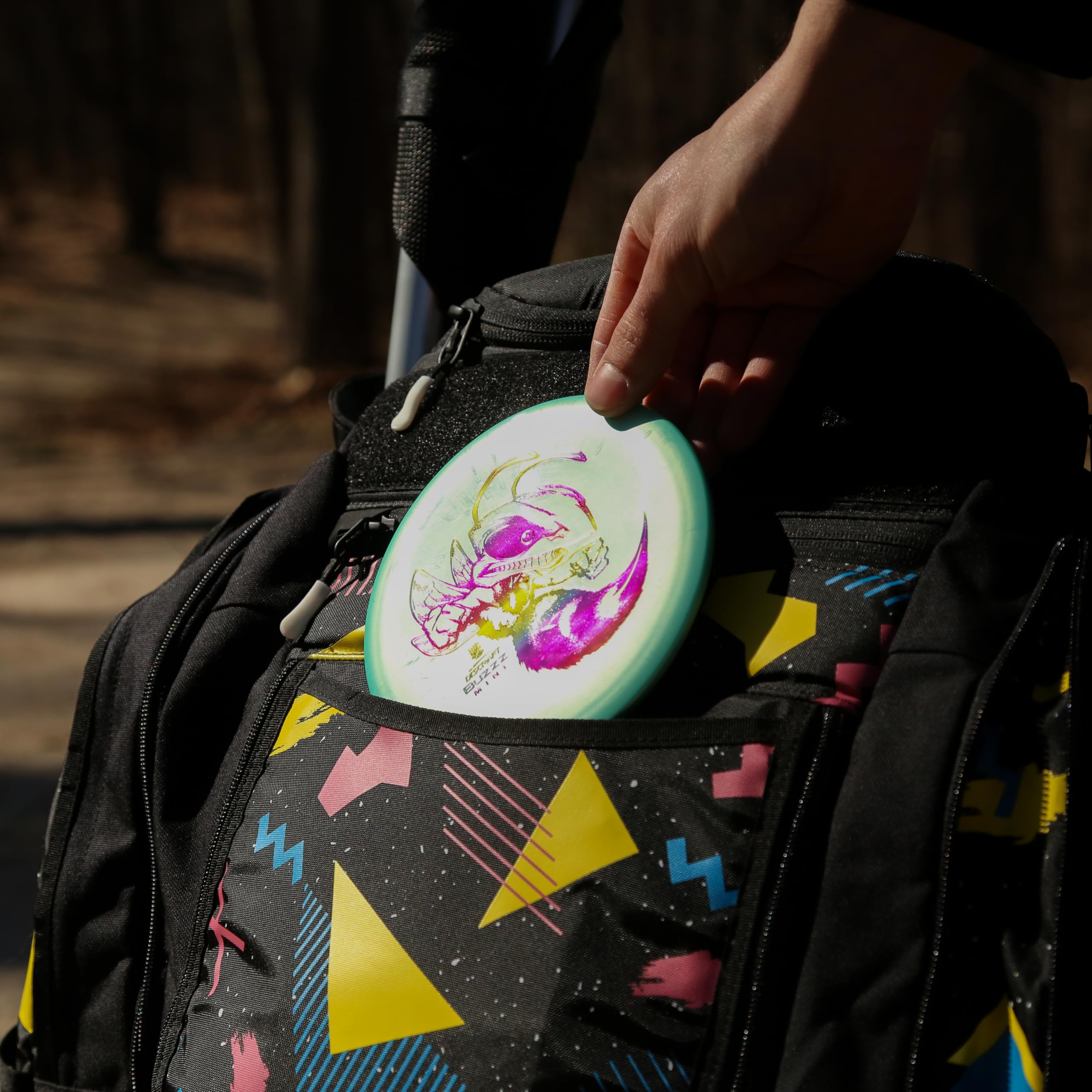 Discraft mini big z foil color variety display showing collectible differences and visual appeal benefit