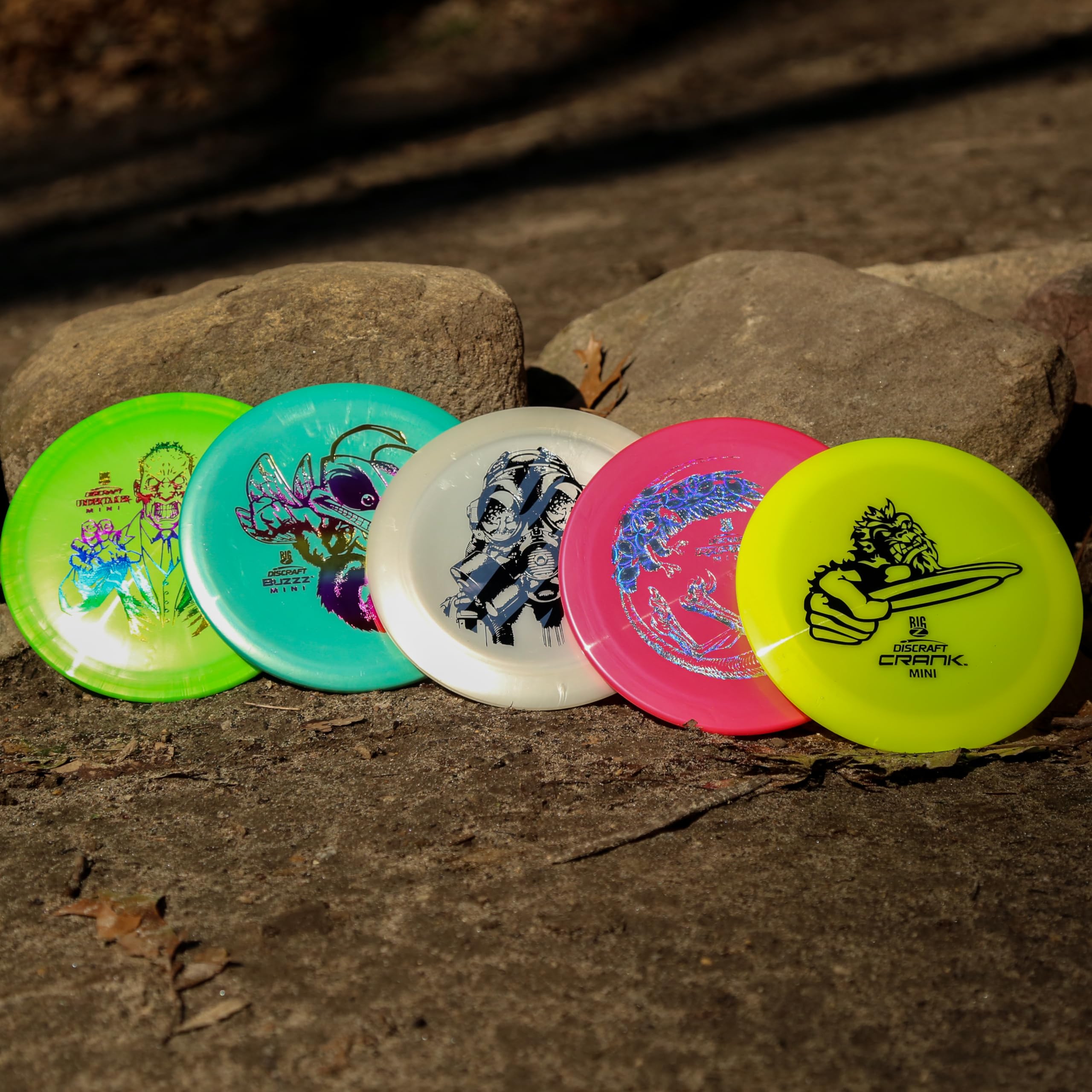Discraft mini big z in hand scale comparison showing portability and pocket-ready benefit