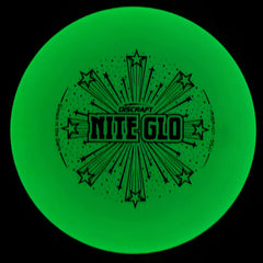 Discraft Ultra-Star held in hand glowing, showing grip detail and night-play visibility