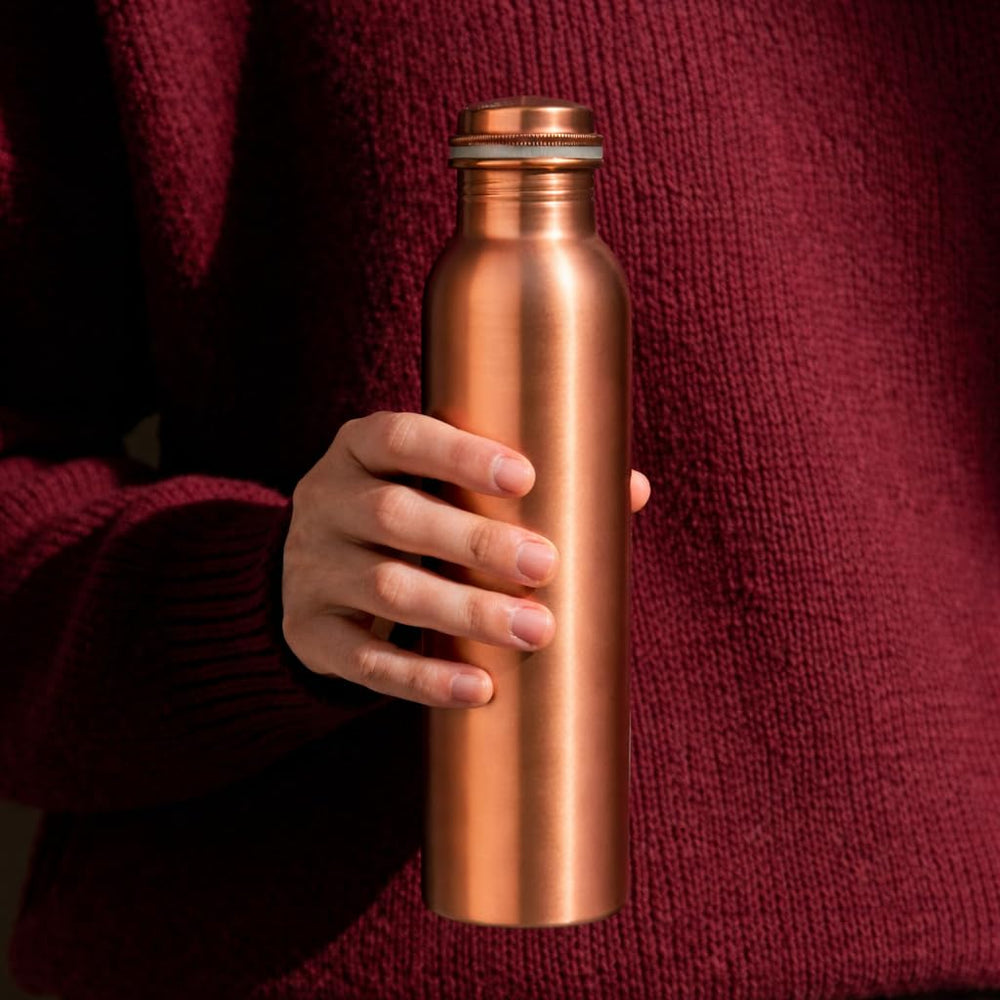 Divine Glance lifestyle yoga studio use showing bottle on mat for convenient on-the-go hydration