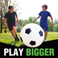 DO U PLAY ball held by adult hands to show scale and portability for travel