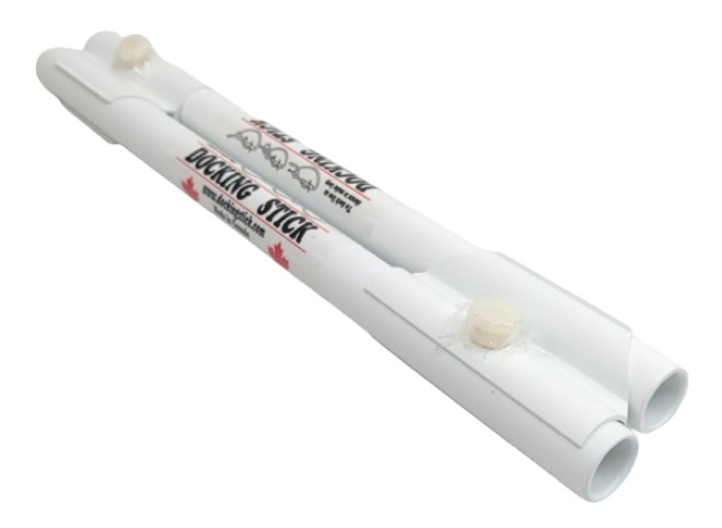 Docking Stick adapter clipped to a boat hook showing secure dock line capture and safer docking
