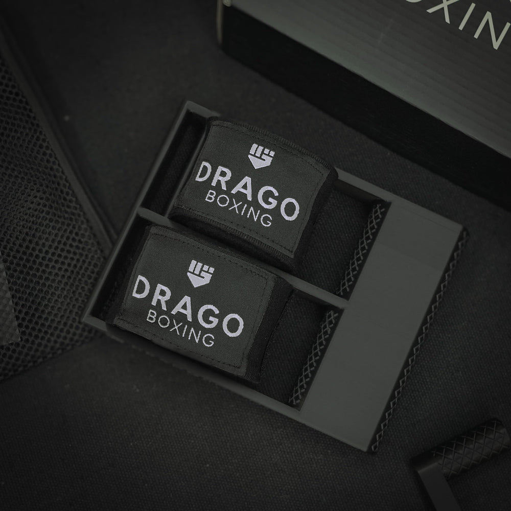 Drago Boxing mesh wash bag open with hand wraps inside protecting velcro and preventing tangles in washer
