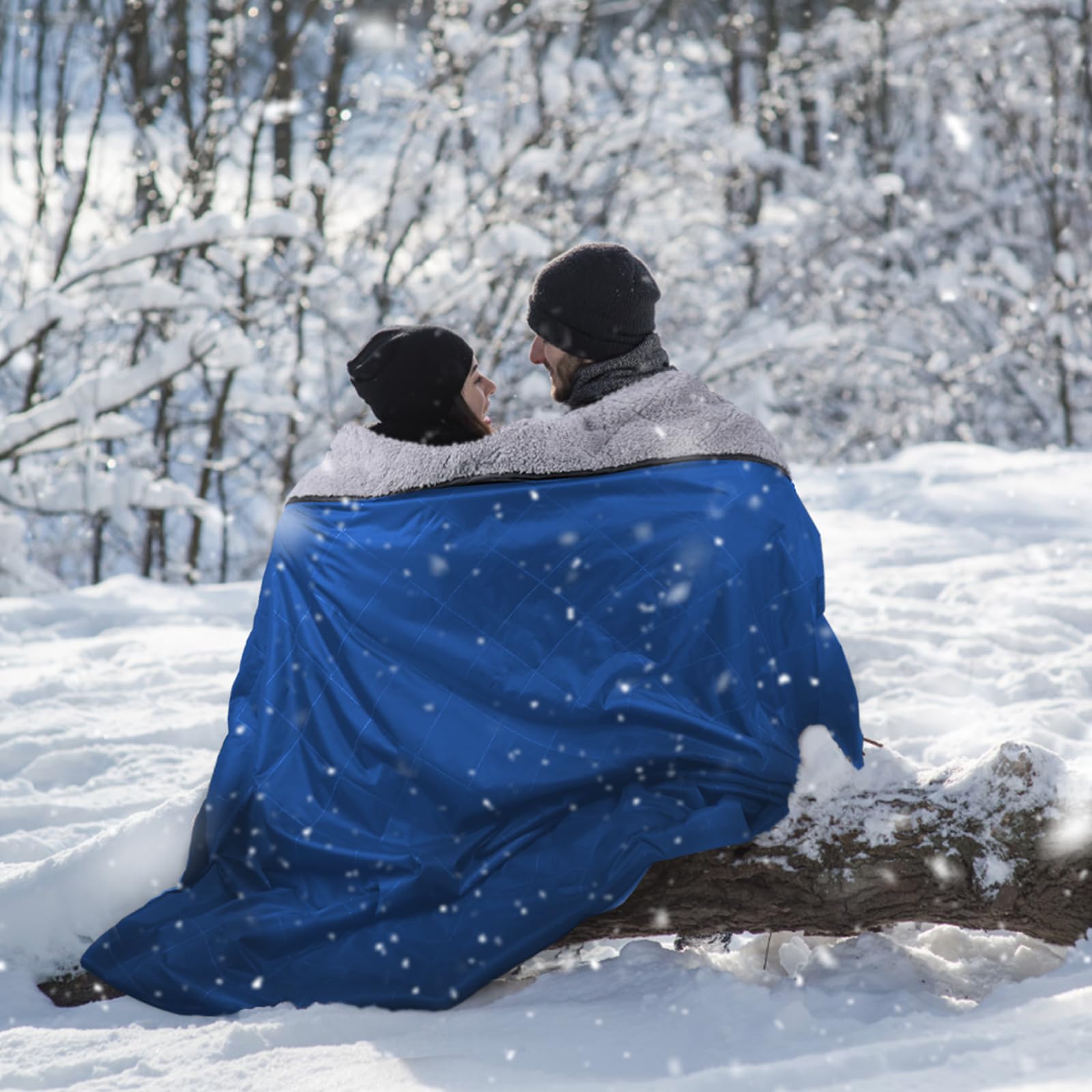 DUKUSEEK size comparison with adults illustrating full-body coverage for two people