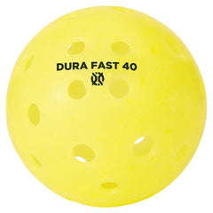 DURA FAST 40 in play on outdoor court with player hitting ball showing consistent flight