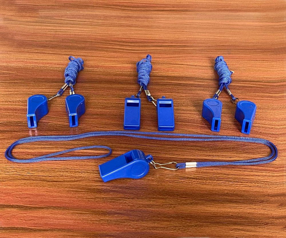 DYBADYSA whistle next to ruler showing size and easy handheld use