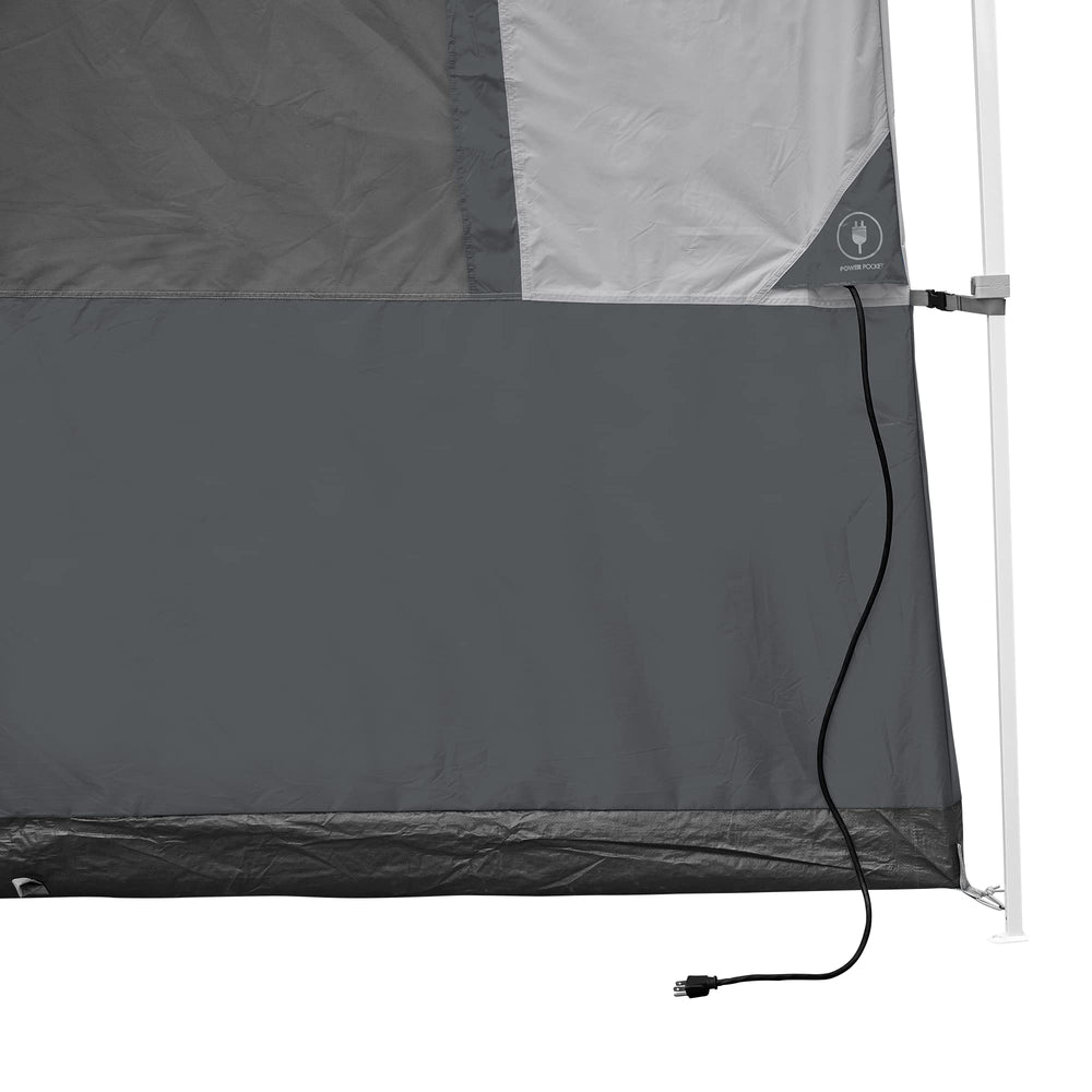 E-Z UP Camping Cube at night with flaps closed for privacy and light control