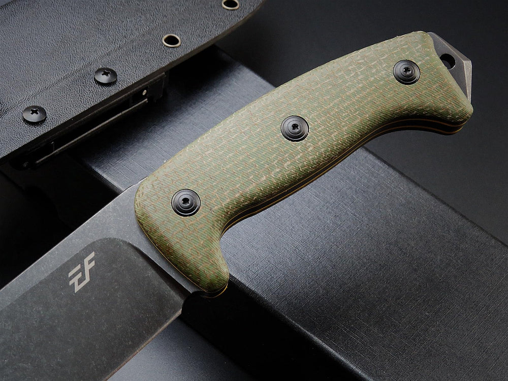 Eafengrow EF148 held in hand illustrating ergonomic full-tang control and scale