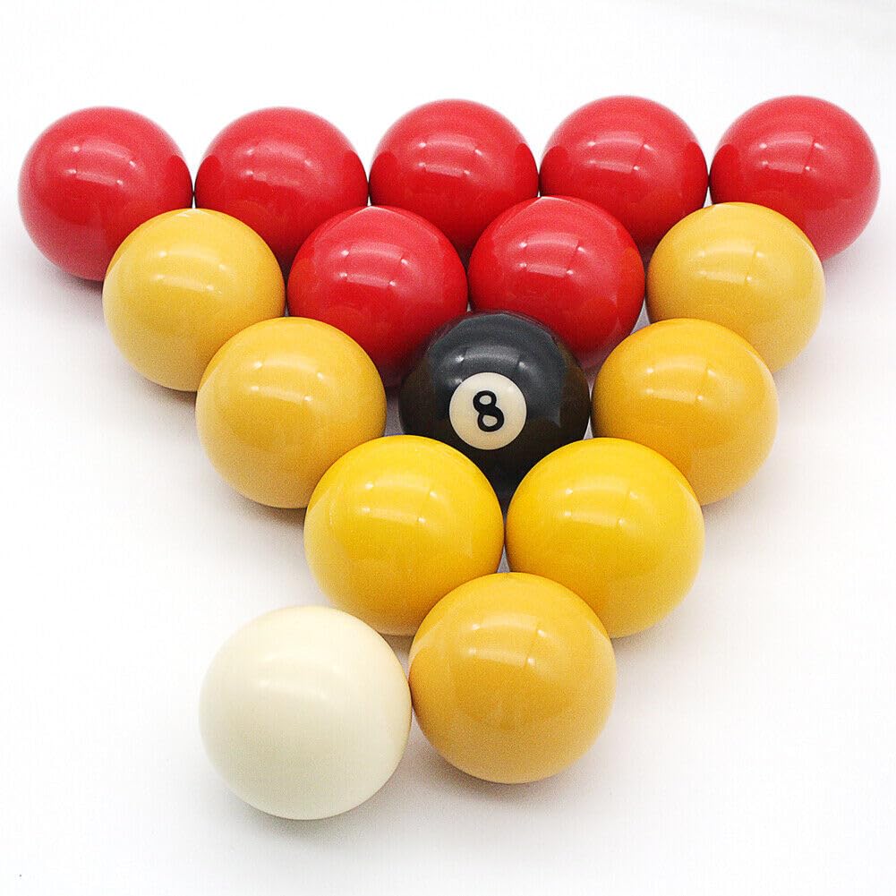 east eagle balls next to ruler showing 2-1/4 inch regulation size