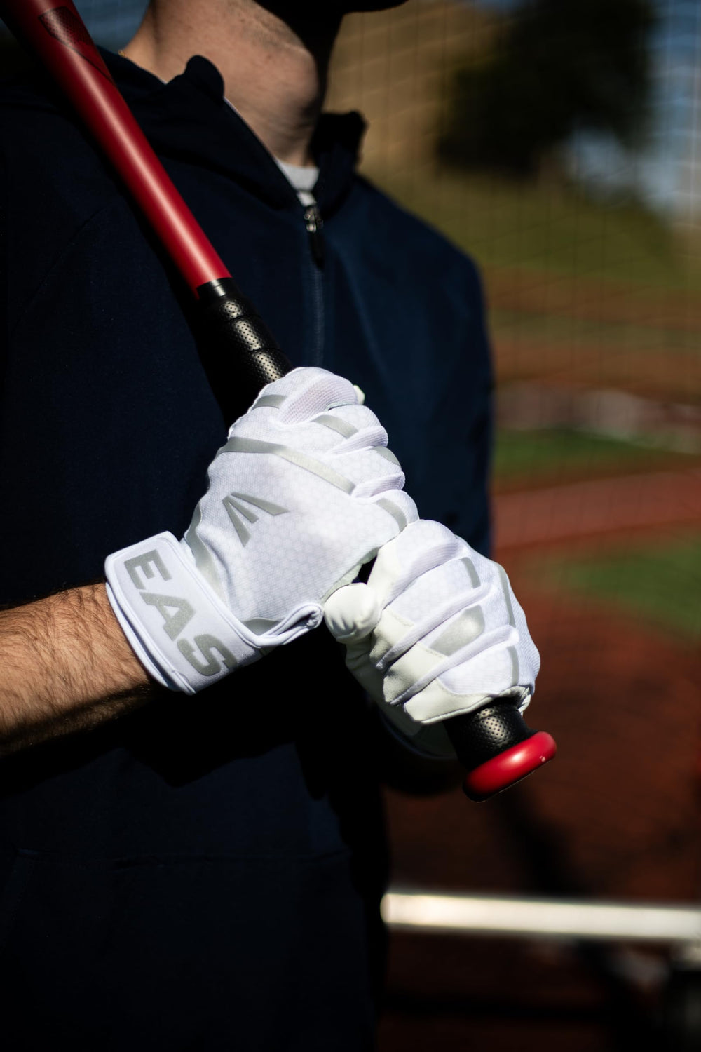 Easton MAV GT being worn at the plate demonstrating fit and swing control