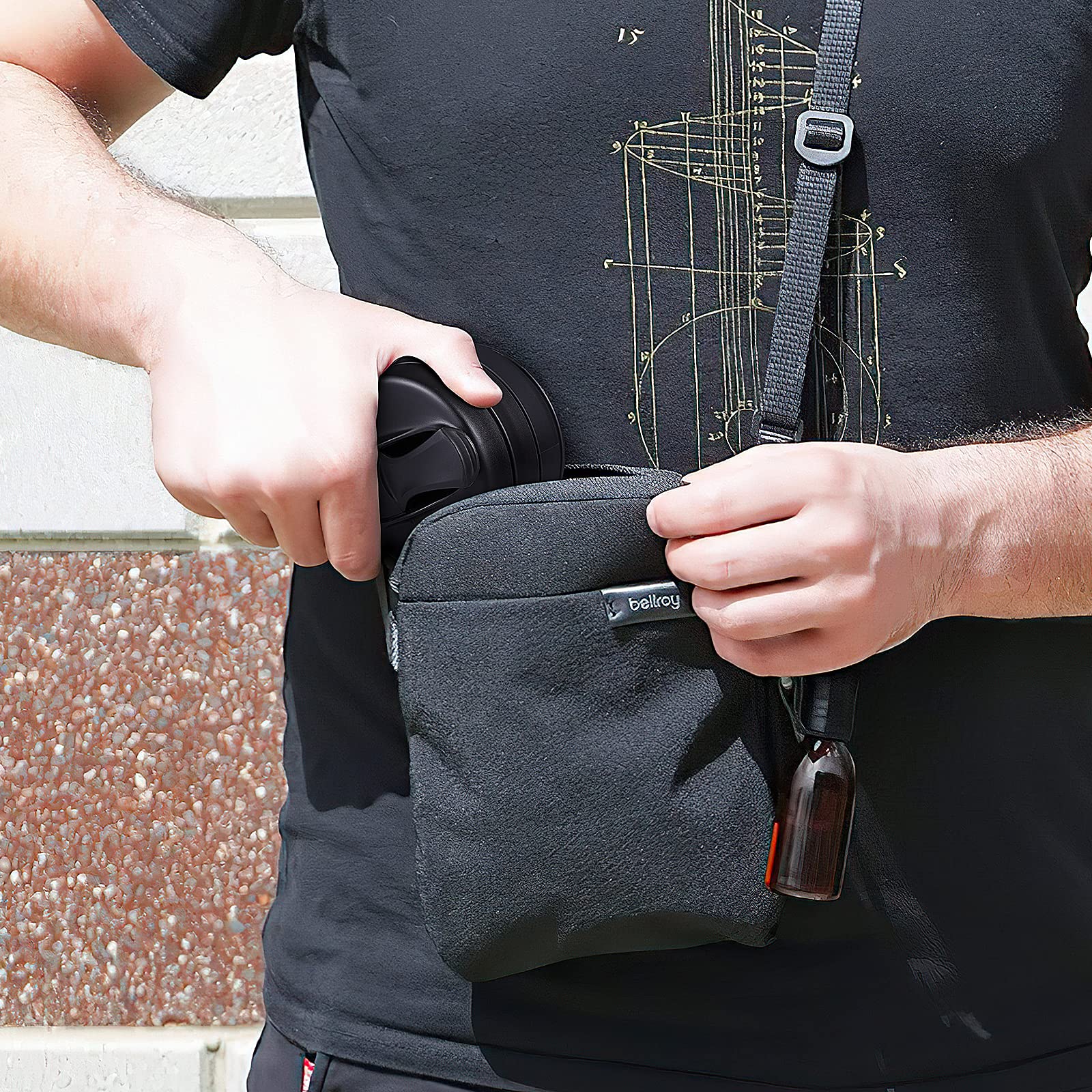 EASYXQ cup hooked to backpack strap showing hands-free carry benefit