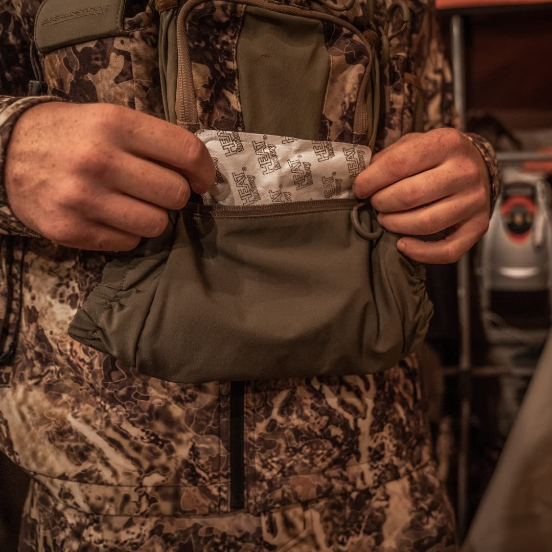 Eberlestock Recon Handwarmer next to gloves showing size and scale