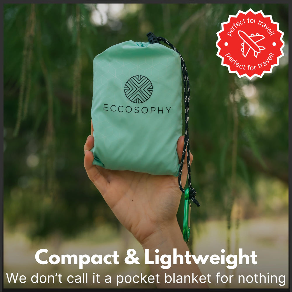 ECCOSOPHY packed blanket clipped with carabiner for hands-free carry