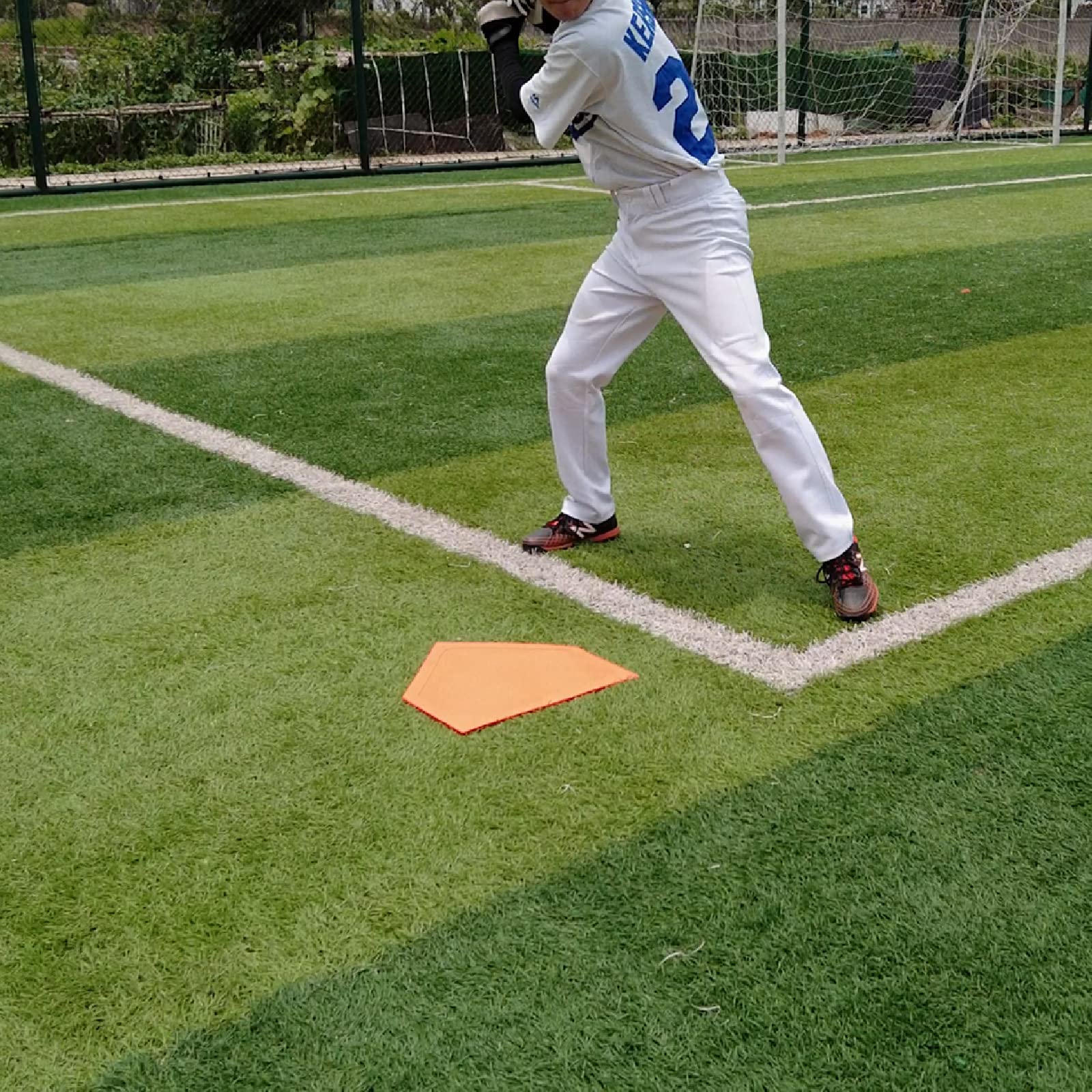 Eco Walker home plate and pitcher's rubber detail showing accurate practice feel