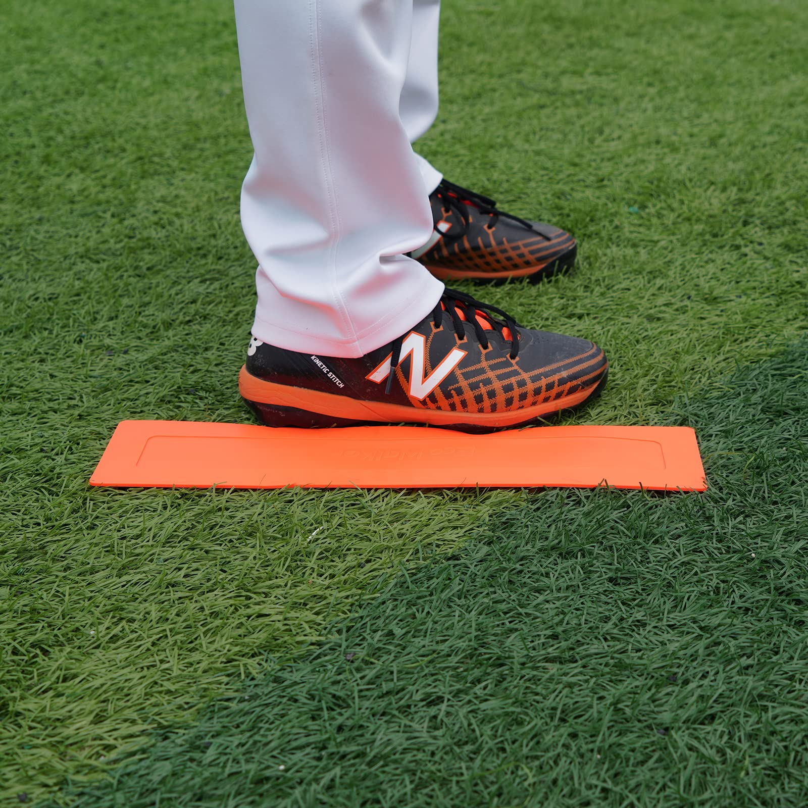 Eco Walker base next to a foot showing size and safe low-profile design