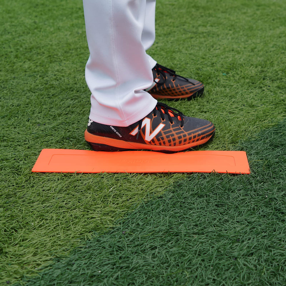 Eco Walker base next to a foot showing size and safe low-profile design