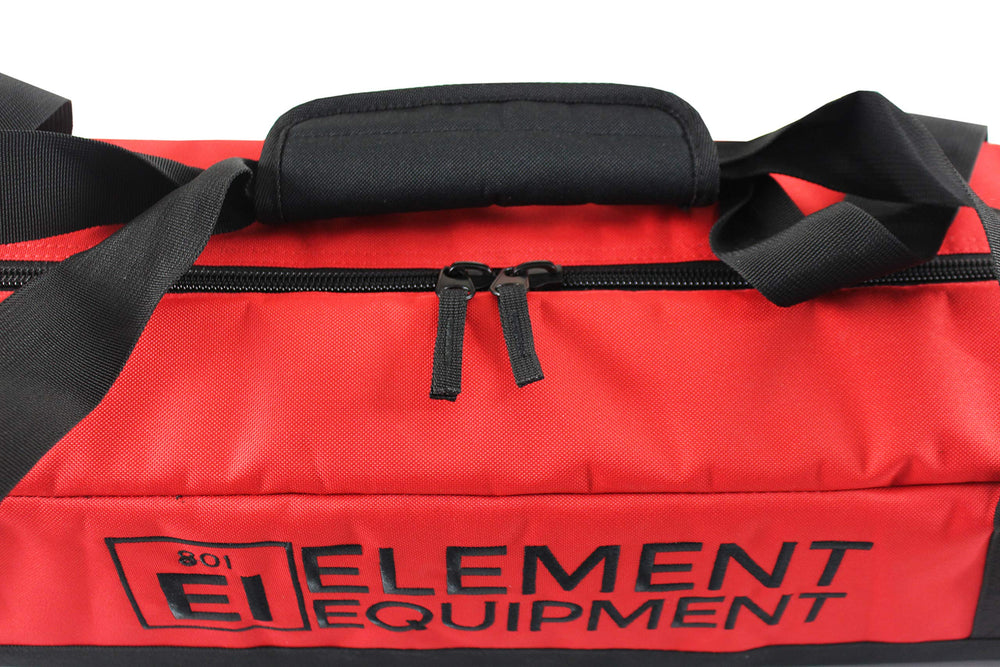Element Equipment traveler carrying red bag in airport, easy carry for transfers