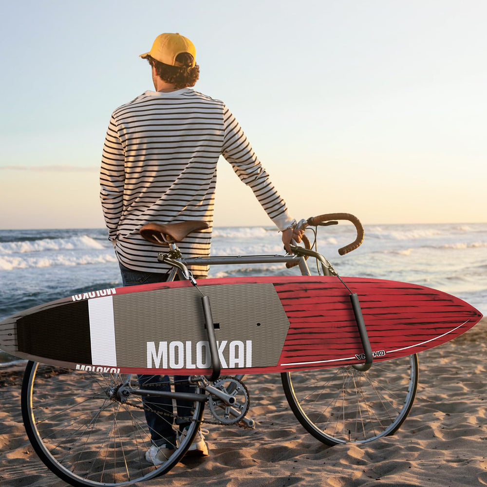 Enjoyard lifestyle shot biking to beach for convenient board carrying