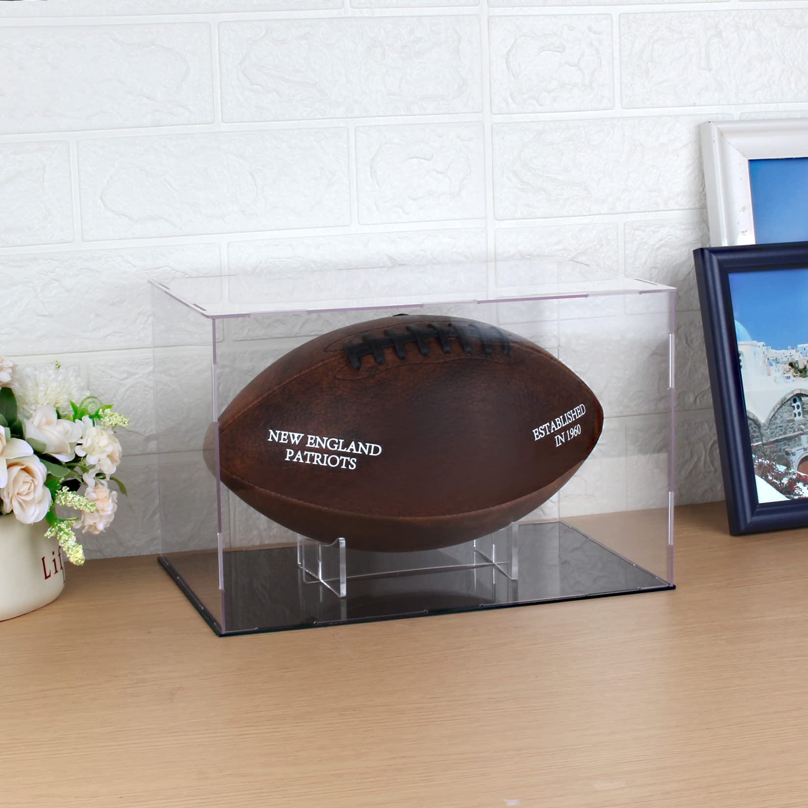 evron scale shot with football showing fit and size reference benefit