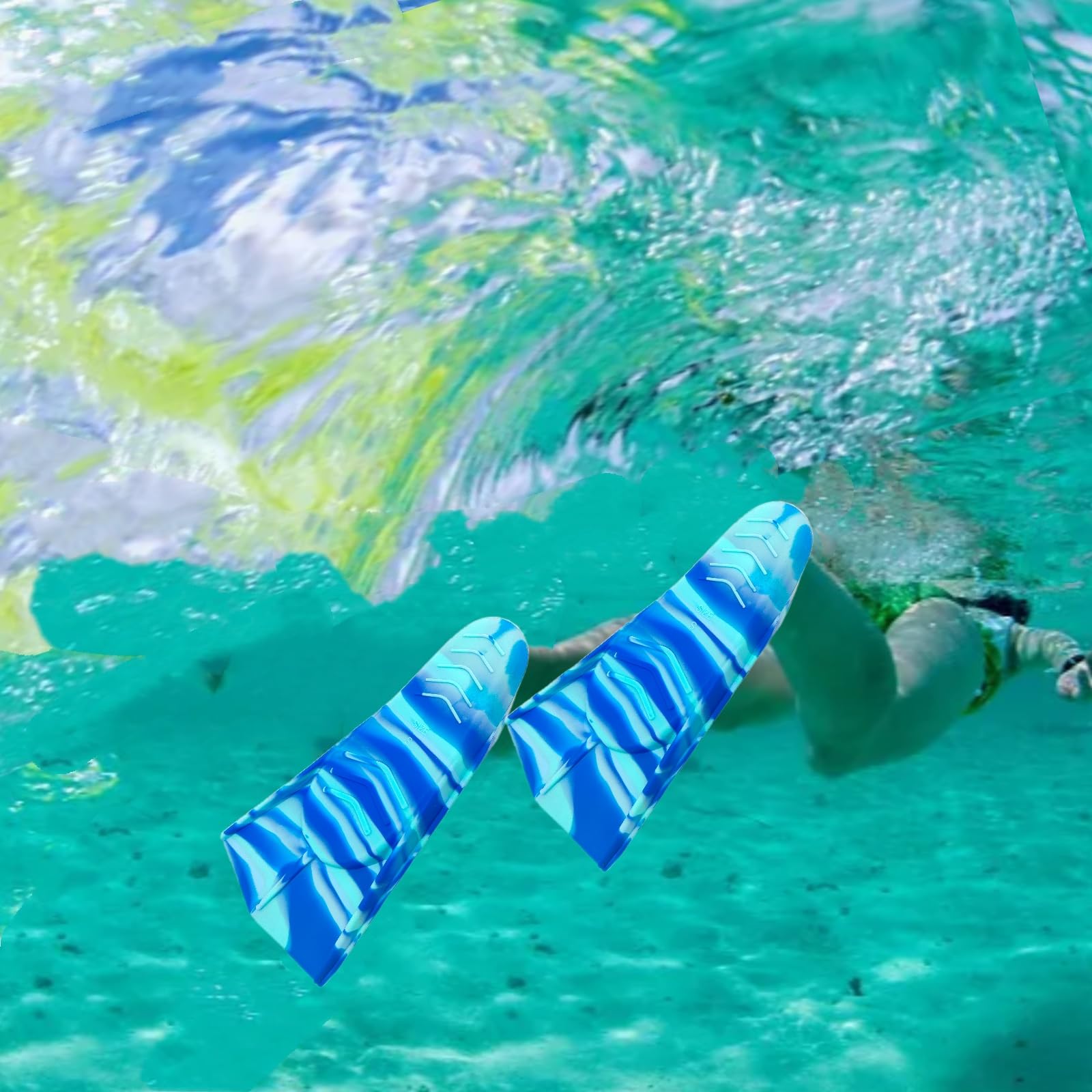 Fadgesy fins with snorkel gear on beach showing travel-ready convenience