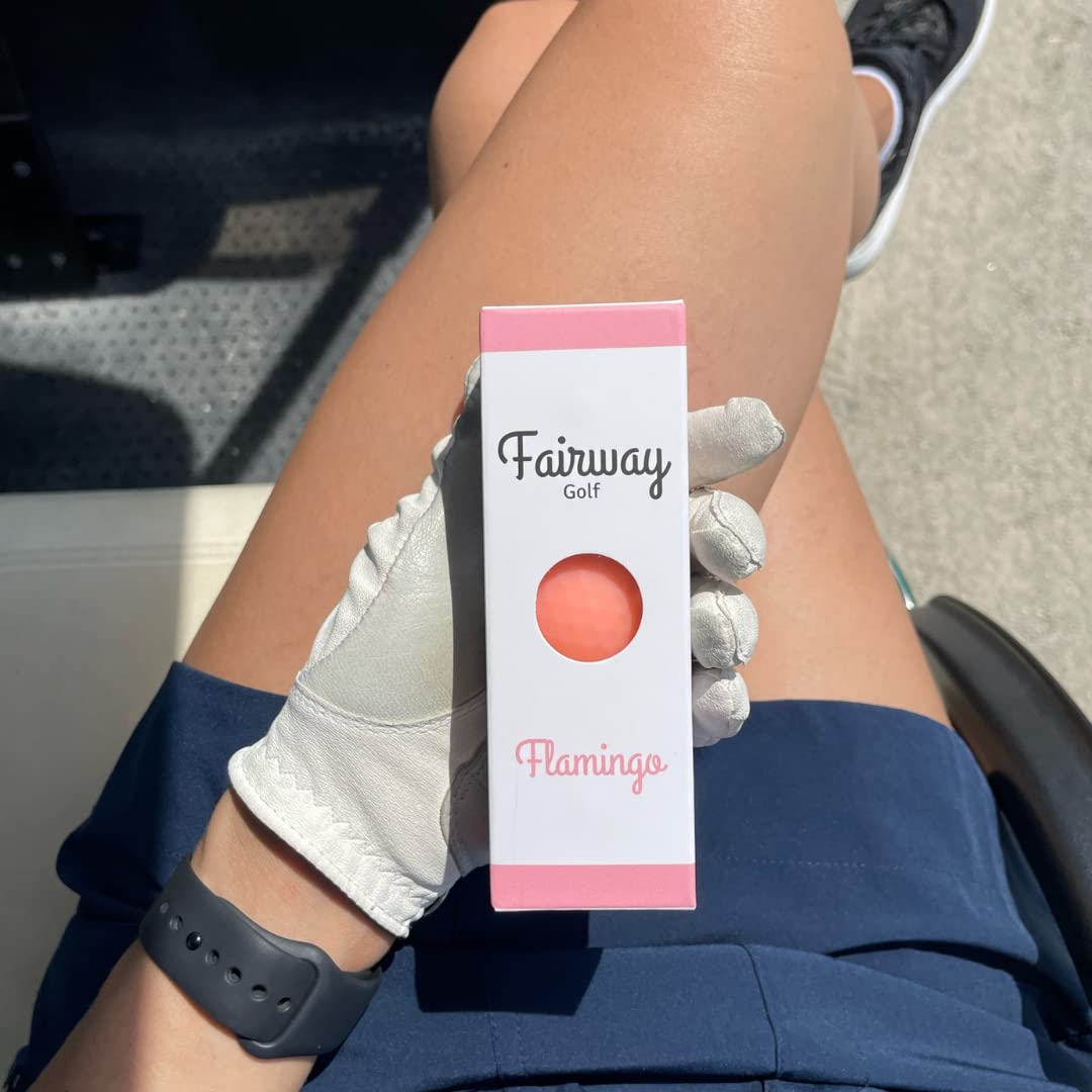 Fairway Golf ball on green near flag showing accuracy and target visibility