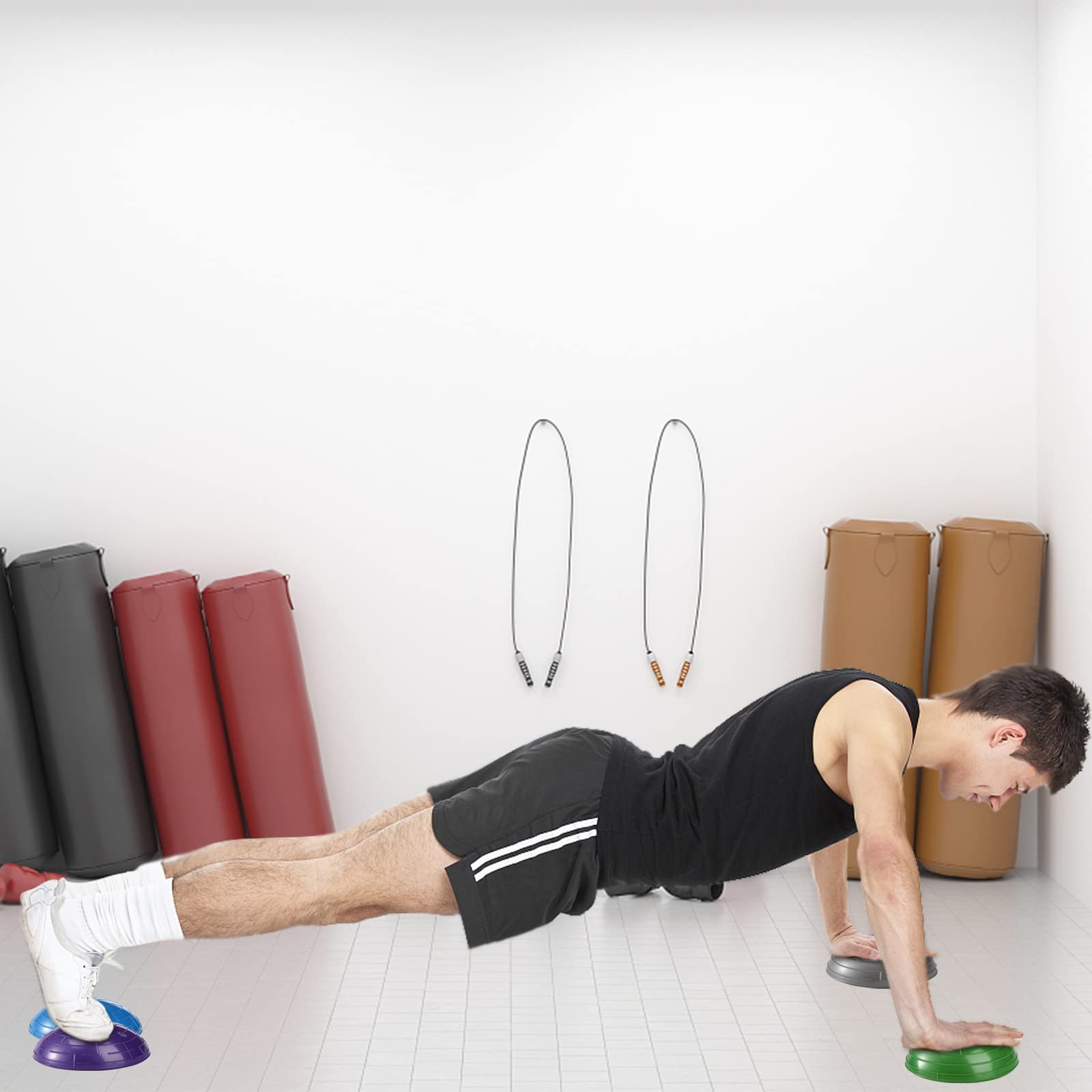 Fasmov pod placed under foot during squat to enhance ankle control