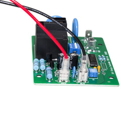 FBULWSEC board installed inside EZGO charger housing illustrating correct placement and function