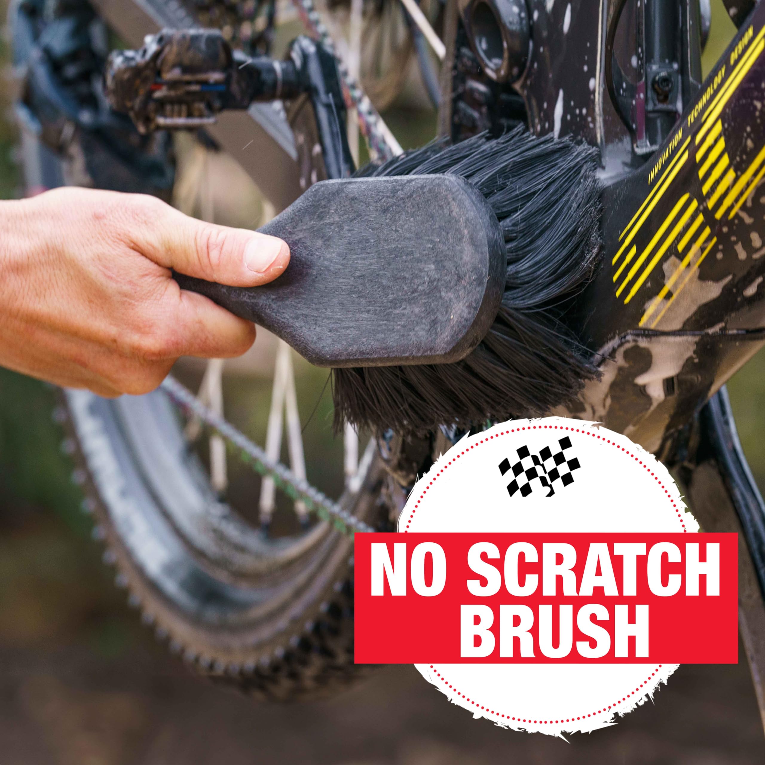 Finish Line chain brush in use cleaning a bike chain for improved drivetrain care