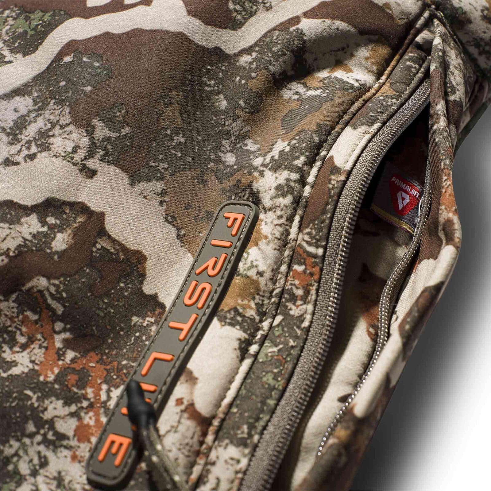 First Lite Specter muff worn on treestand keeping hands warm and ready
