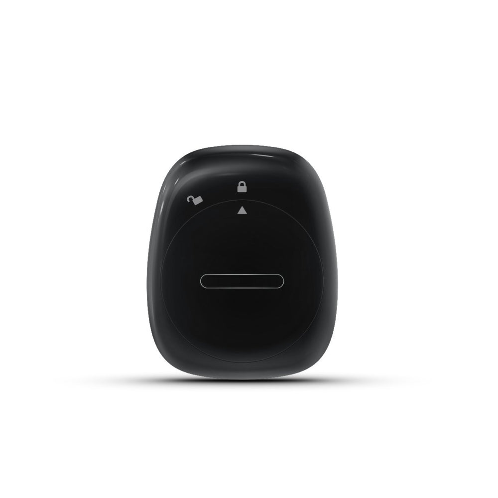 Fitbit Zip next to a coin for scale showing compact size and portability benefit