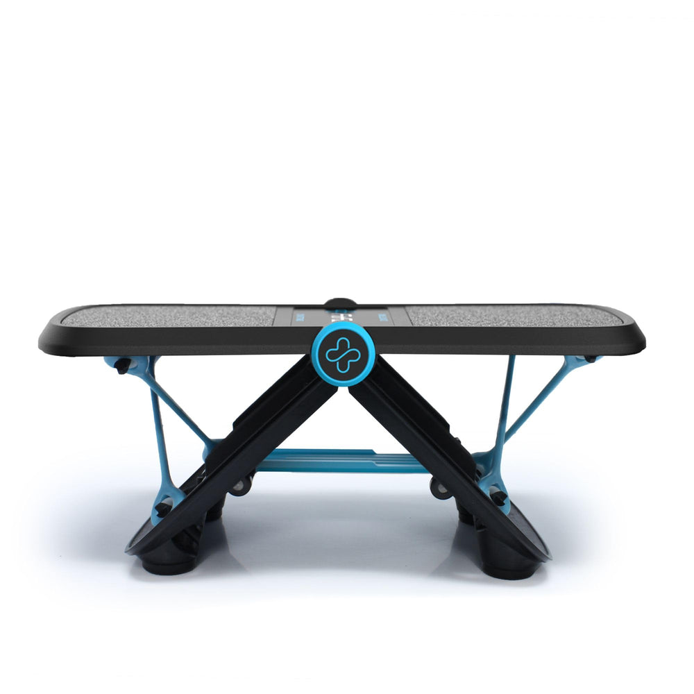 FitFoot with foot on pedal in use promoting ankle mobility