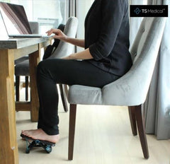 FitFoot placed under desk in office enabling discreet leg movement