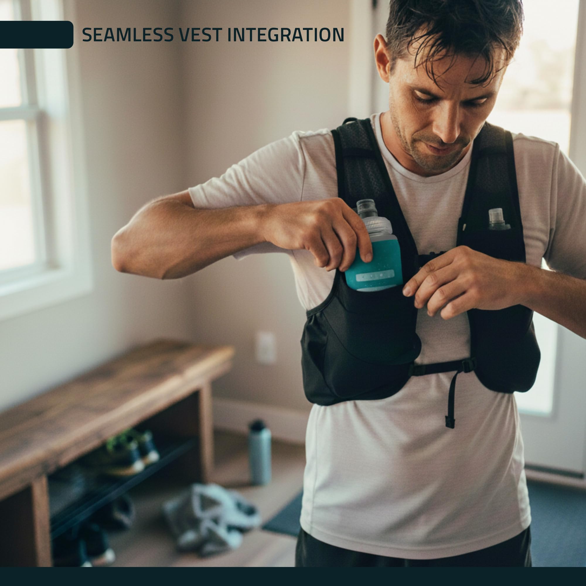 FITLY soft flask in hand showing 17 oz scale and comfortable grip
