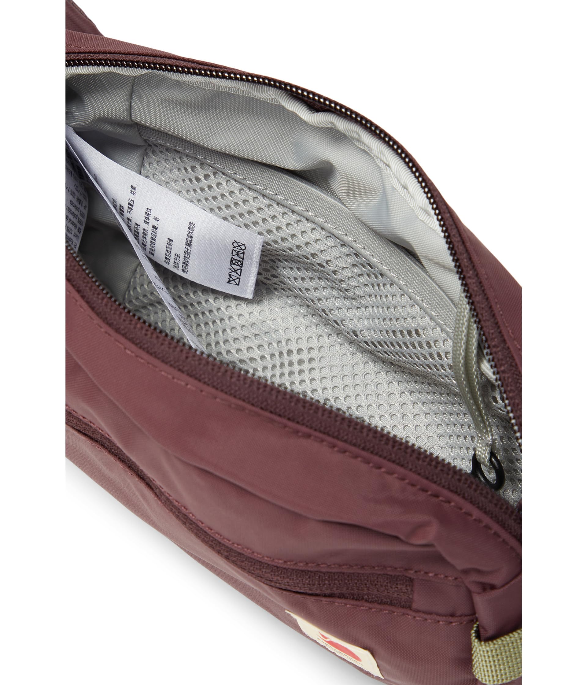 Fjällräven recycled polyamide fabric close-up highlighting waterproof texture and durable stitching for weather resistance