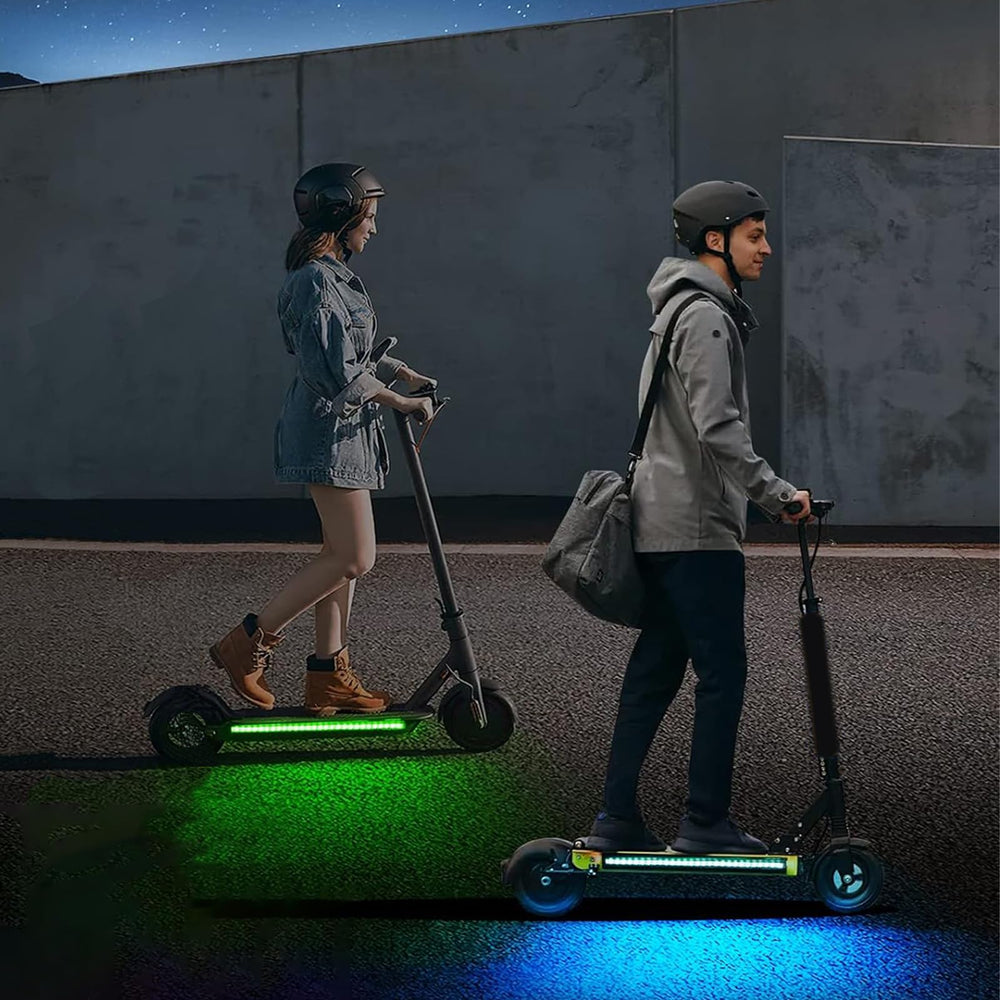 FOVNOT scooter at night with illuminated strips demonstrating visibility