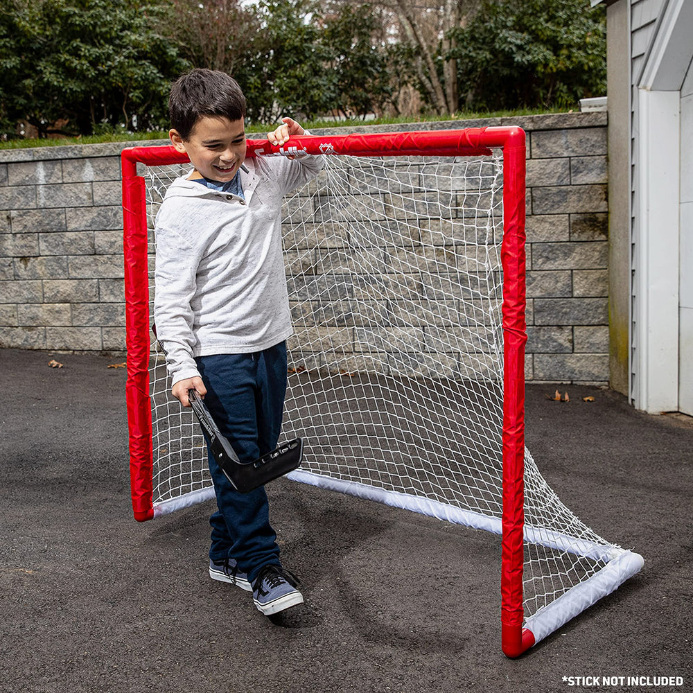 Franklin Sports sleeve net being slid onto post for fast tool-free assembly advantage