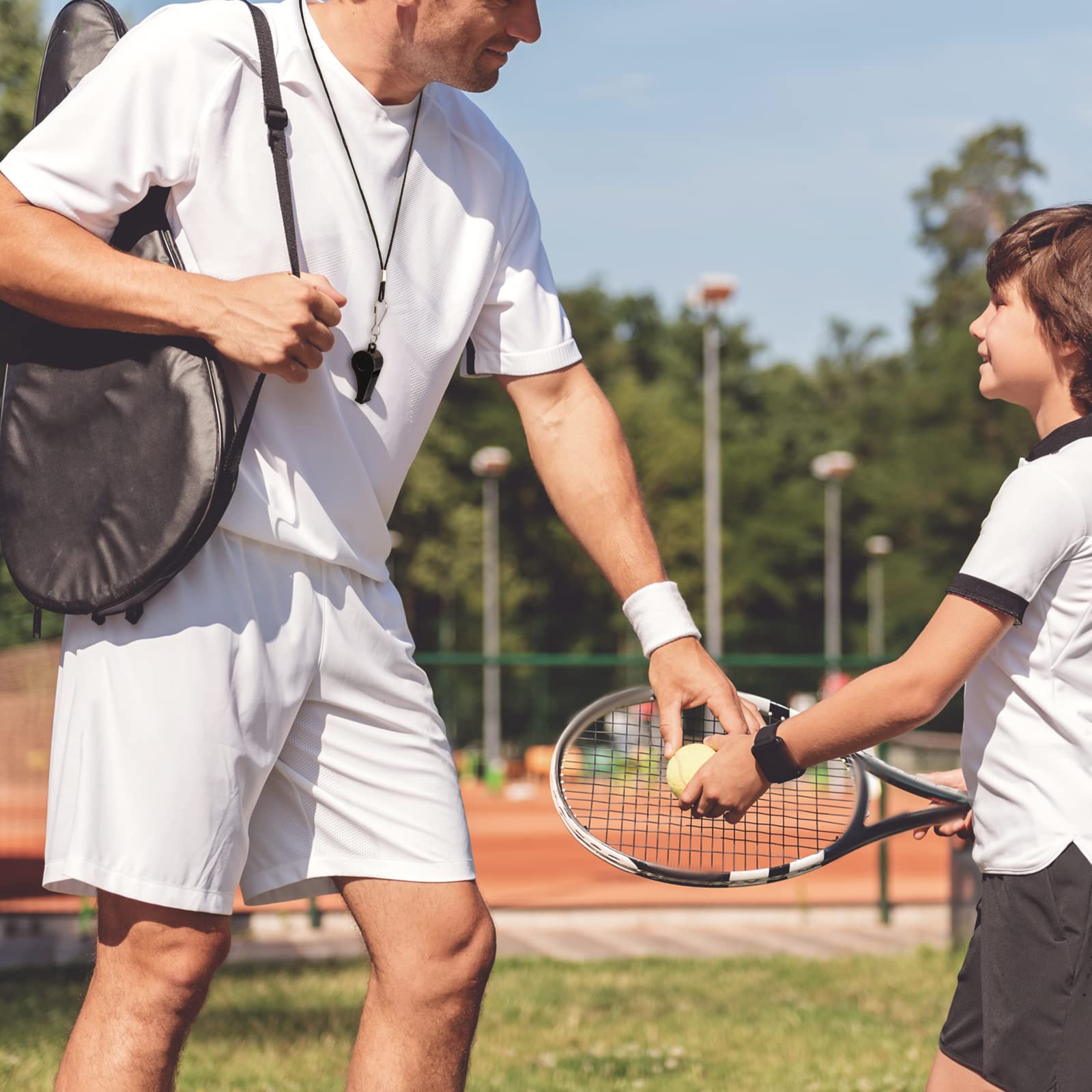 Frienda whistle in use by referee demonstrating reliable signaling on field