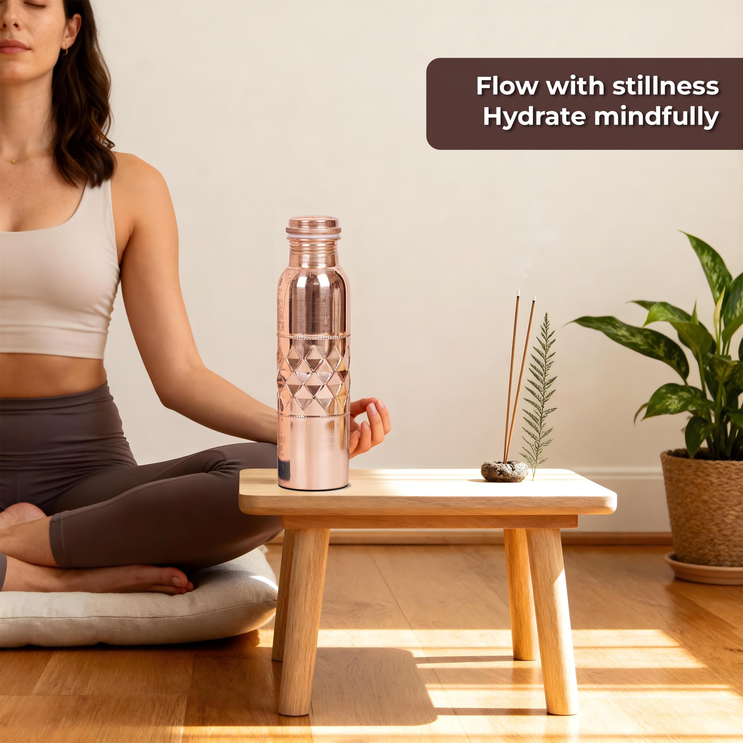 FURNISHFUL FINESSE held in hand to show 1L scale and travel-friendly capacity