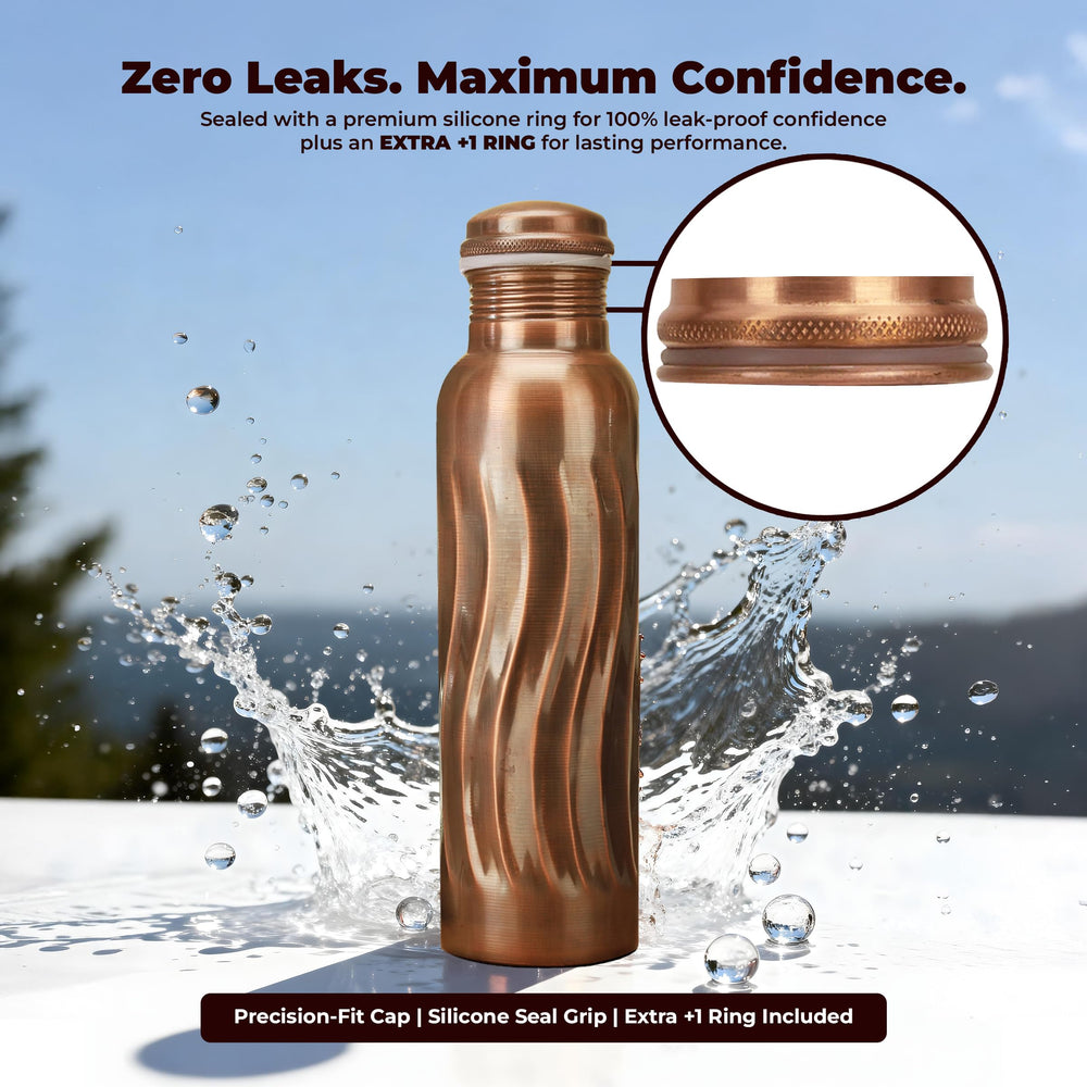 FURNISHFUL FINESSE hand holding bottle to show 34oz scale and travel convenience