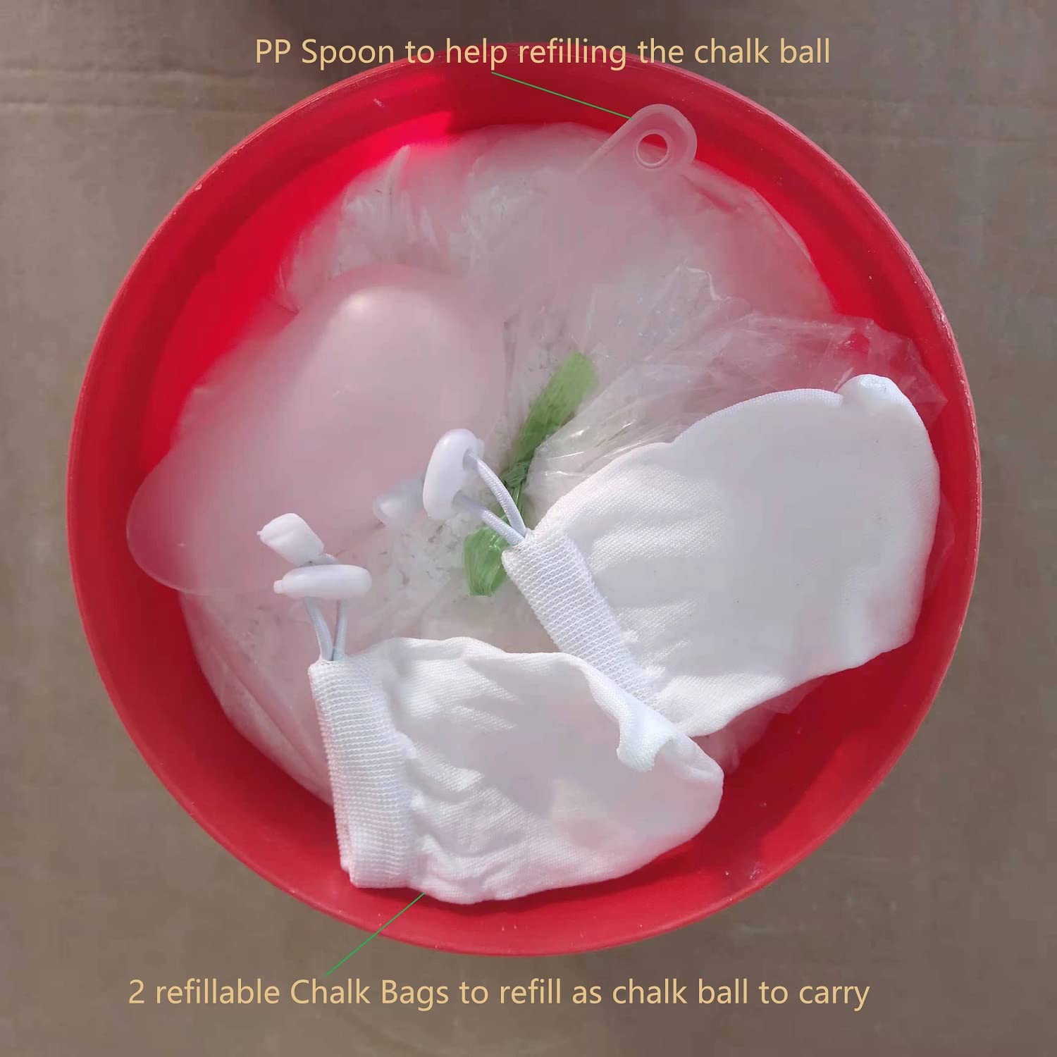 Fuyatina two empty refill chalk bags beside bucket for portable use and convenience