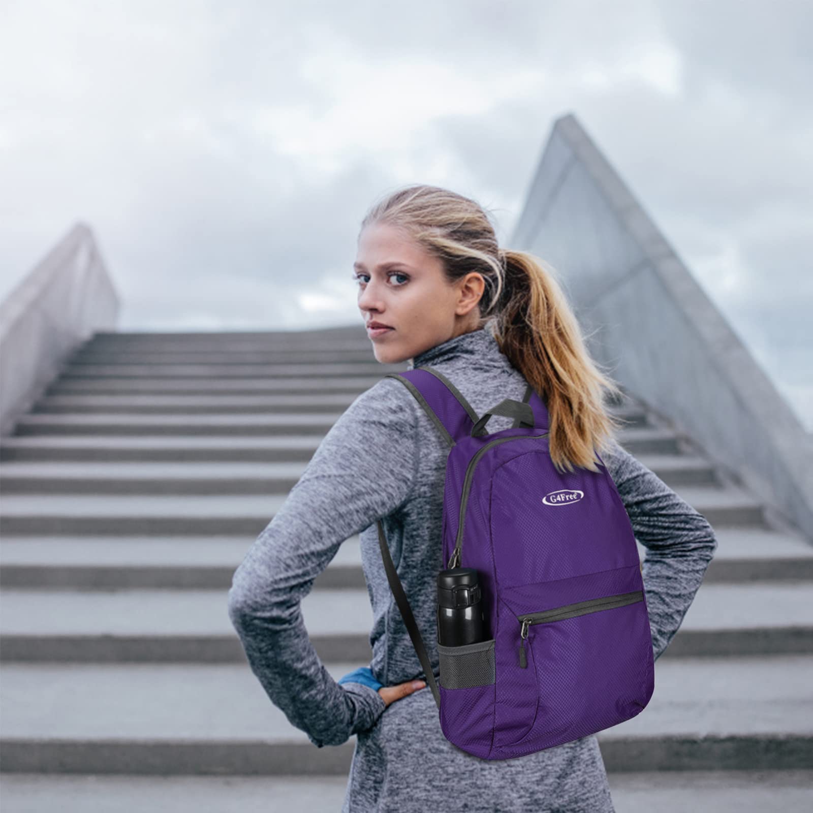 G4Free side view with mesh bottle pocket holding water bottle for on-the-go hydration