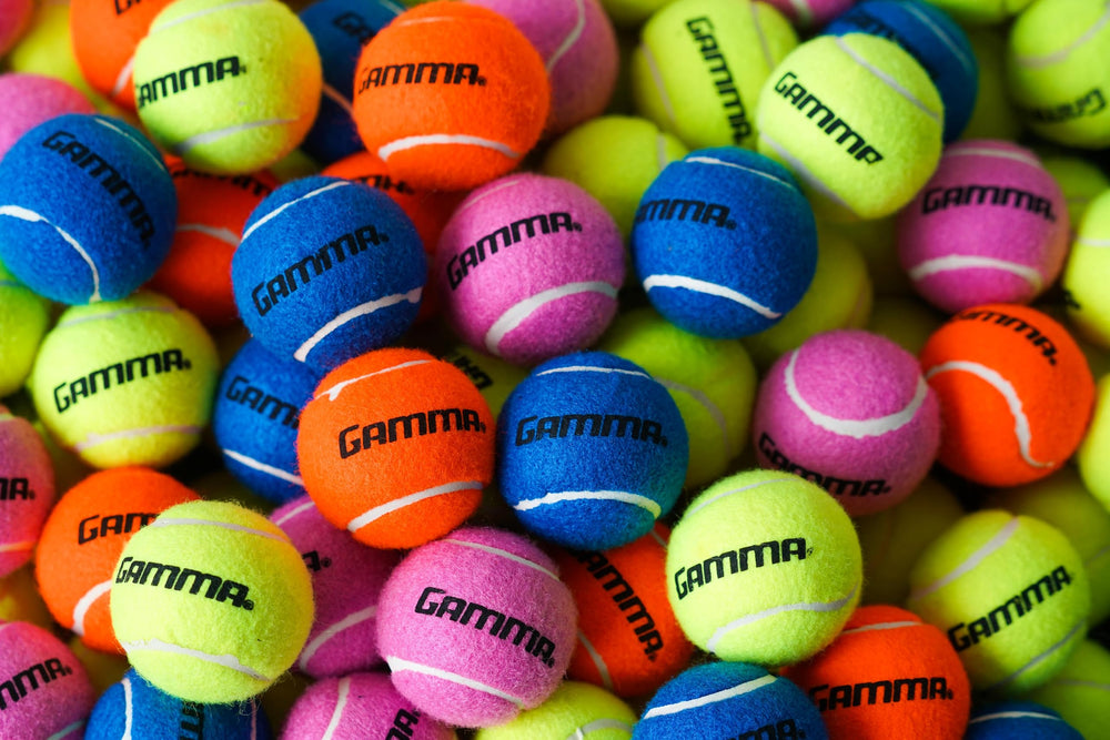 GAMMA coach using balls with group lesson showing convenience and supply
