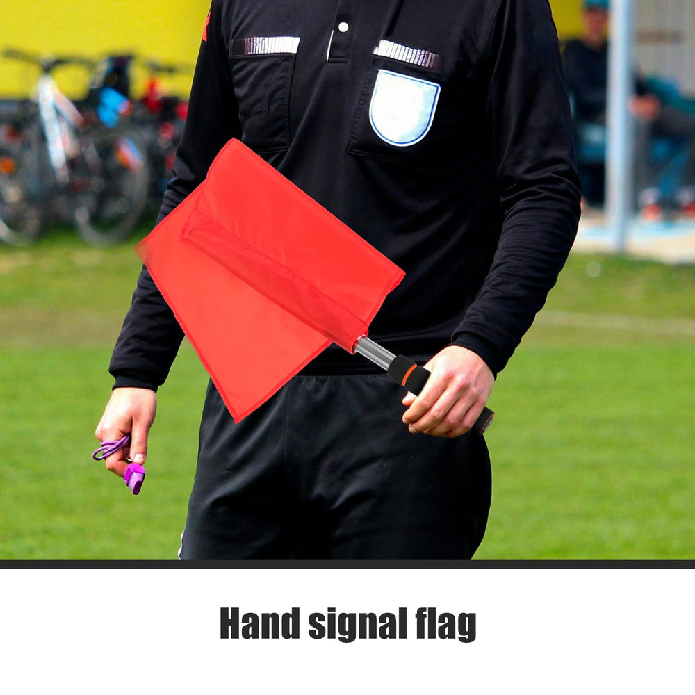 GANAZONO sideline lifestyle shot showing officials using flags confidently