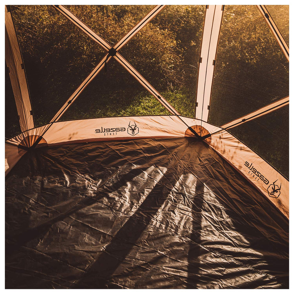 Gazelle Tents footprint next to hands showing size and easy handling benefit