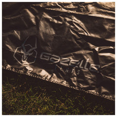 Gazelle Tents five tack-down stakes and reinforced corner for secure anchoring