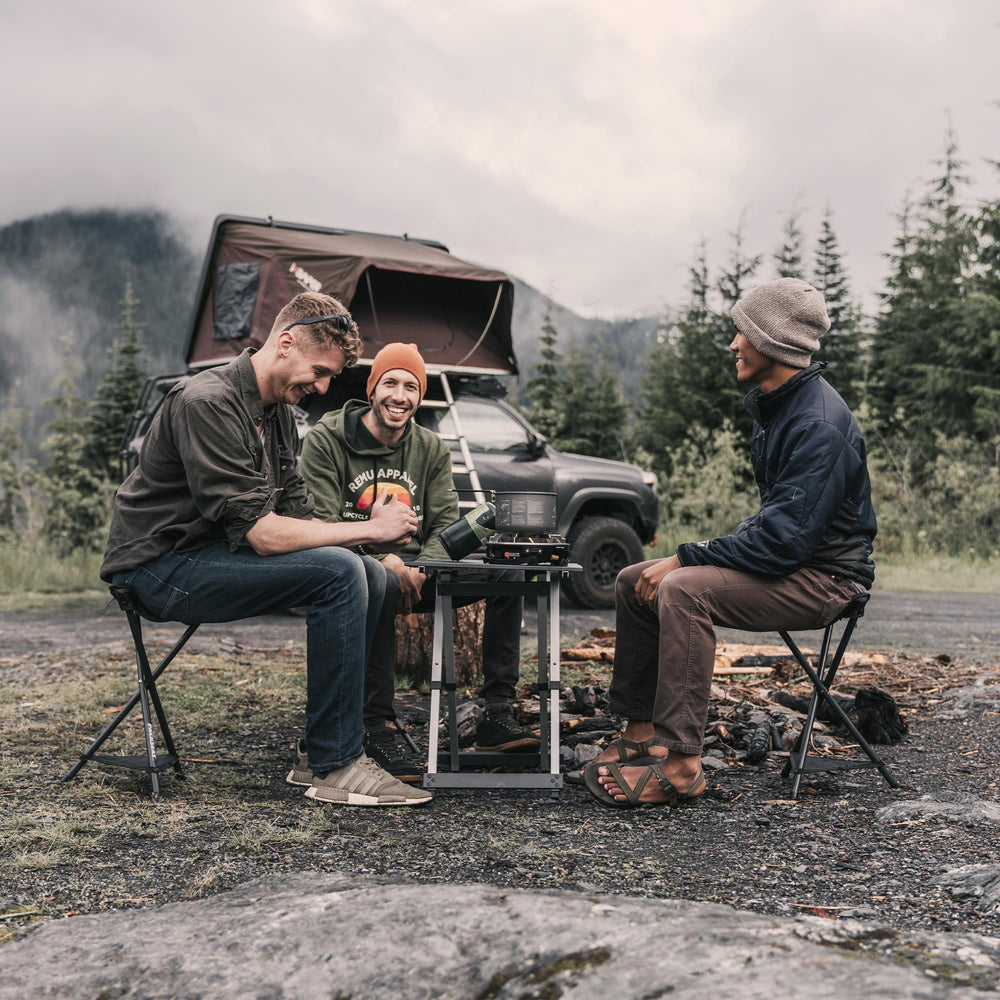 GCI Outdoor PackSeat at a campground lifestyle scene demonstrating versatile use